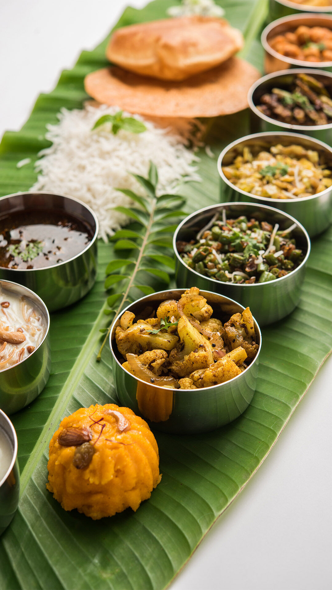 keralas traditional meal served on a banana leaf.